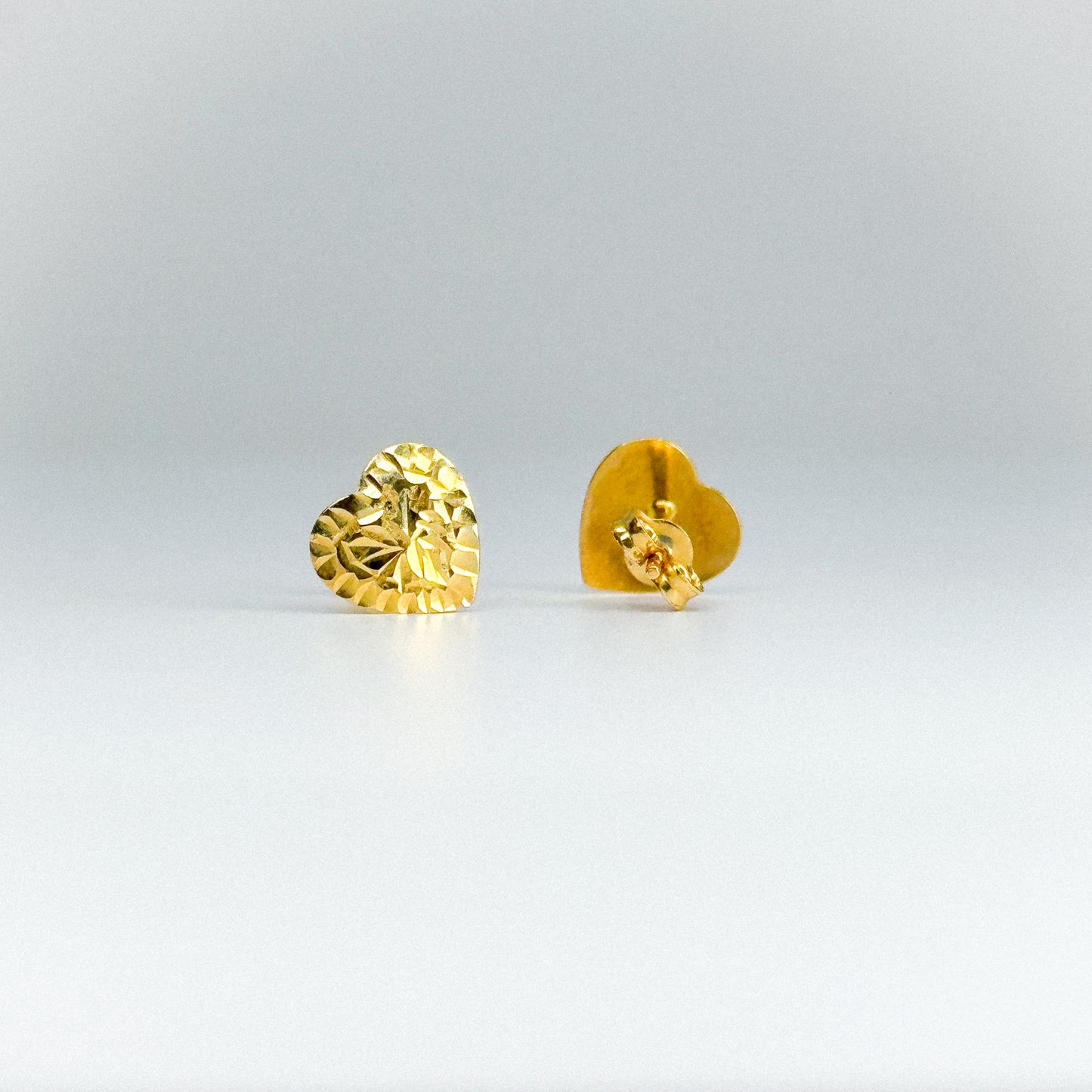 Aretes corazón facetado