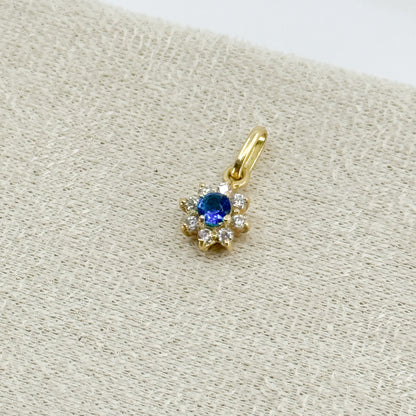 Dije Roseta con piedra azul en oro 18k ✨