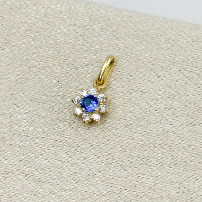Dije Roseta con piedra azul en oro 18k ✨