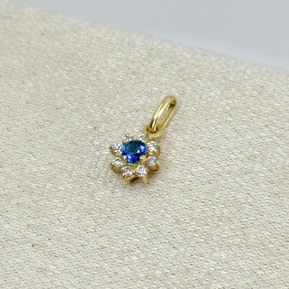 Dije Roseta con piedra azul en oro 18k ✨