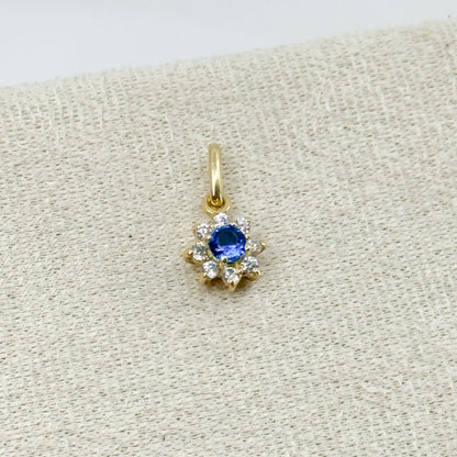 Dije Roseta con piedra azul en oro 18k ✨