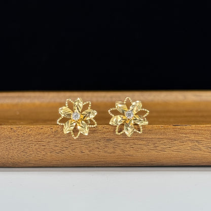 Aretes Flor Destello en Oro 18K