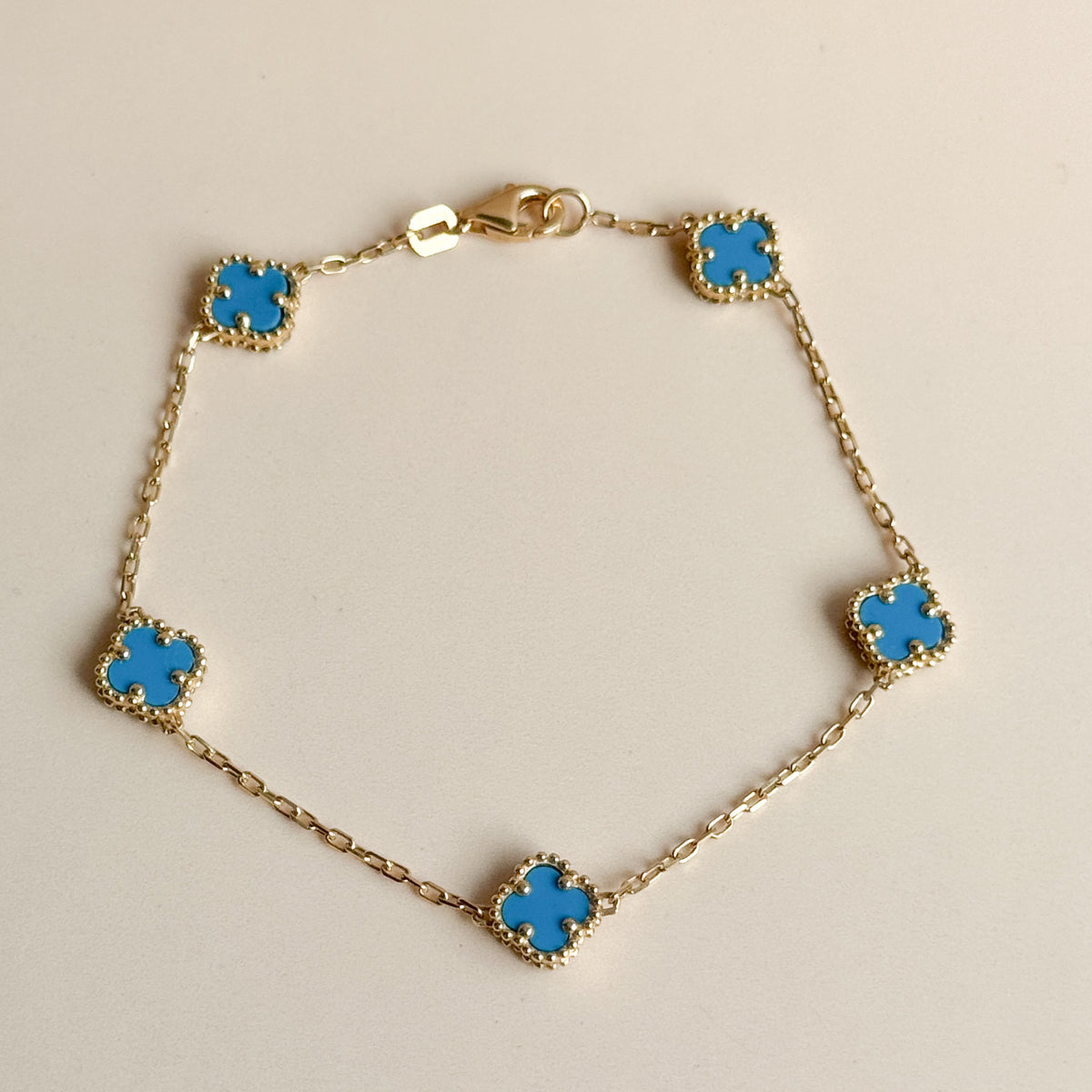 Pulsera Cinco Tréboles Celestes de Oro 18K
