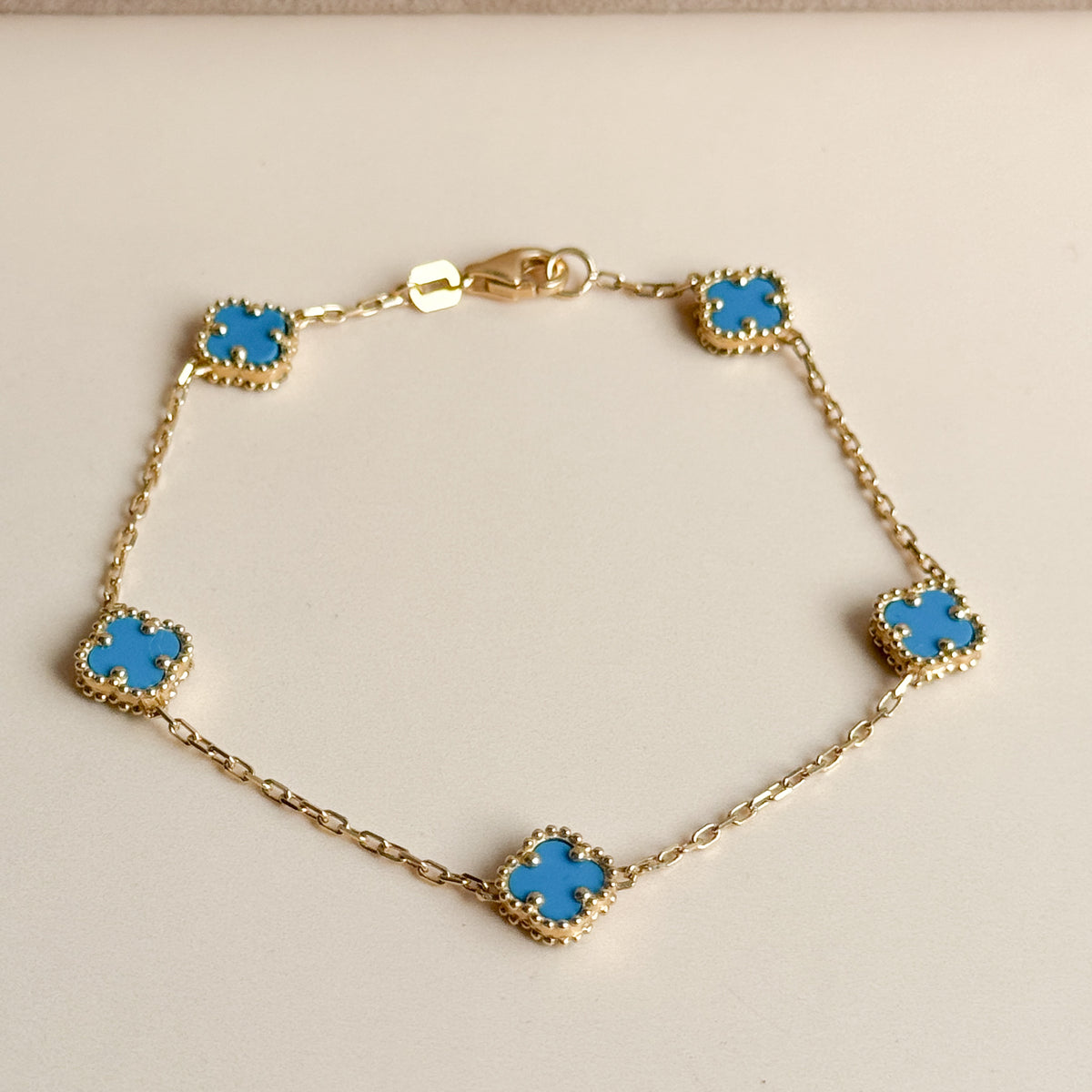 Pulsera Cinco Tréboles Celestes de Oro 18K