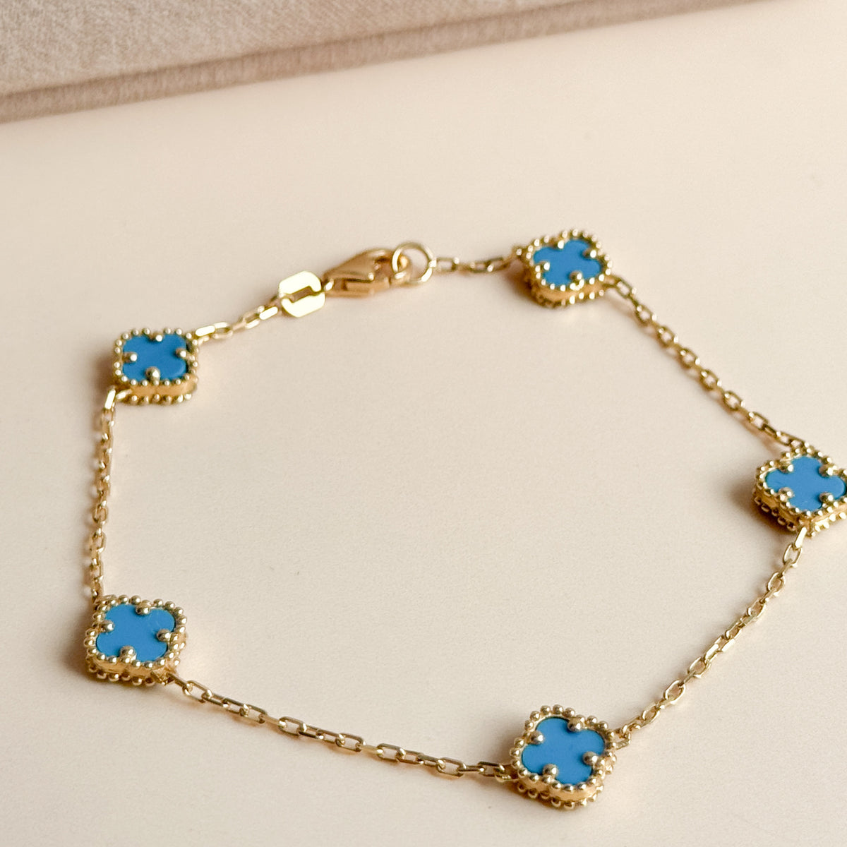 Pulsera Cinco Tréboles Celestes de Oro 18K