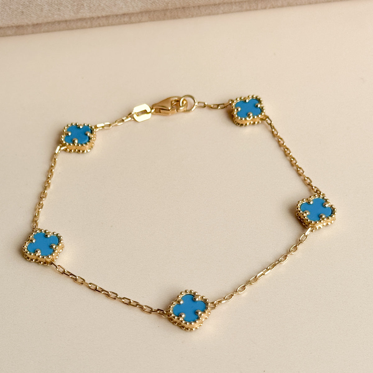 Pulsera Cinco Tréboles Celestes de Oro 18K