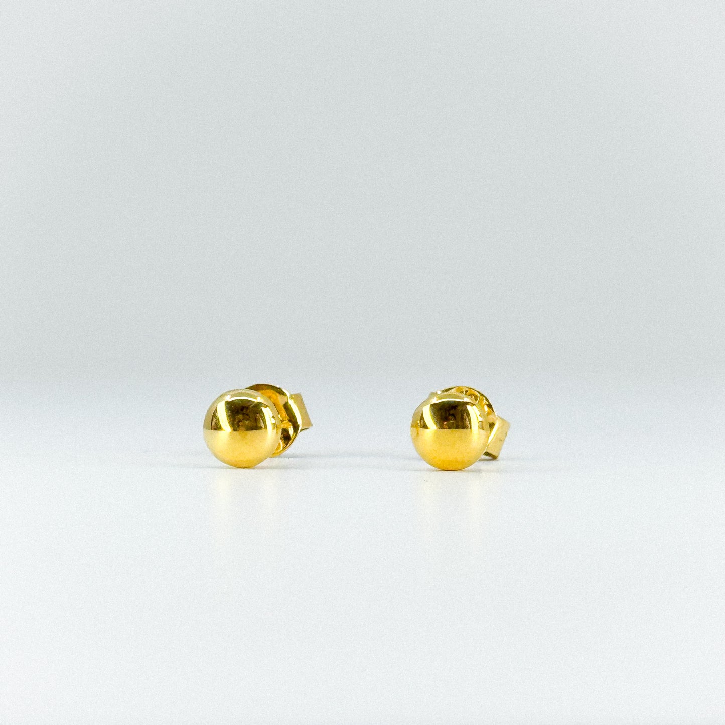 Aretes lenteja maciza