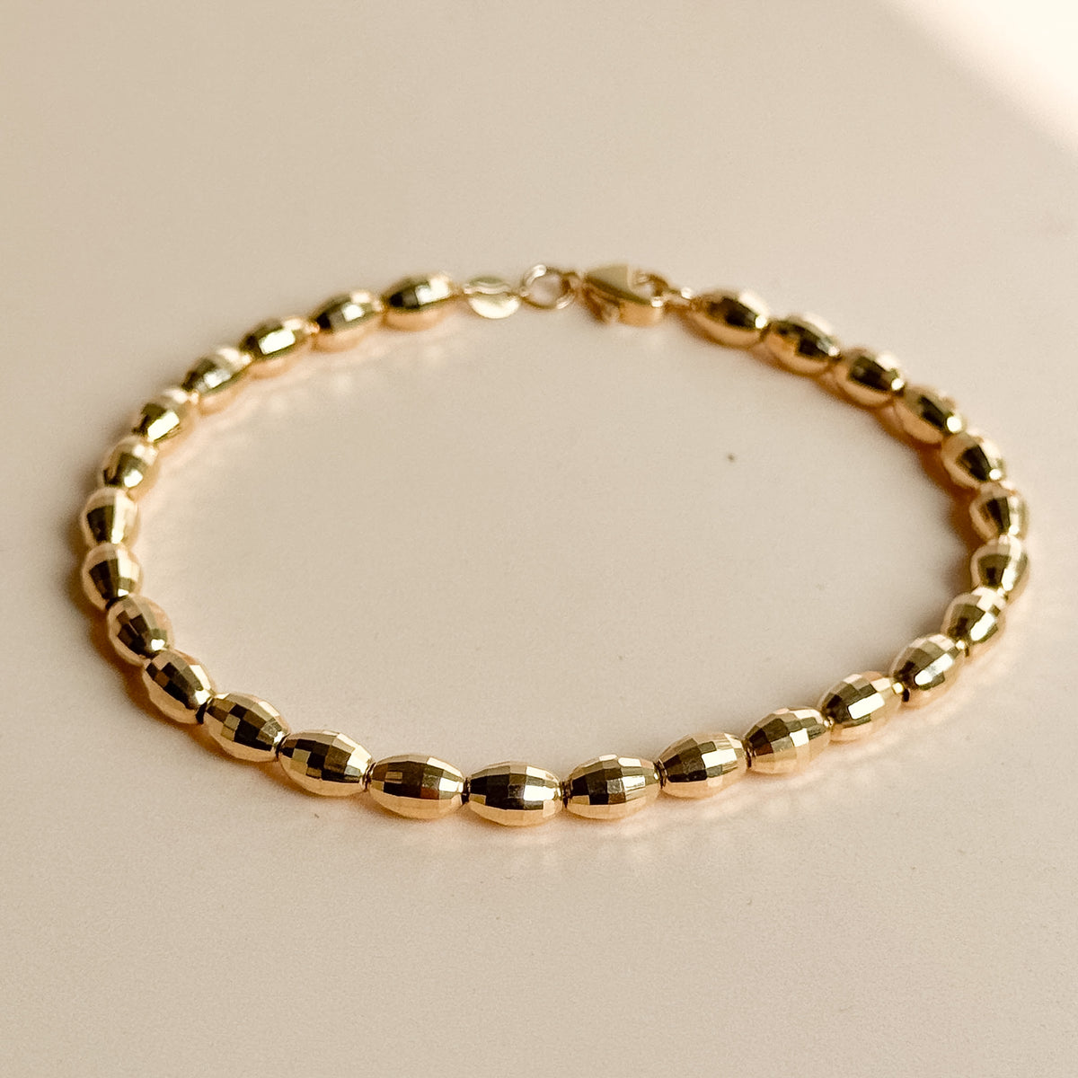 Pulsera de Esferas Facetadas de Oro 18K
