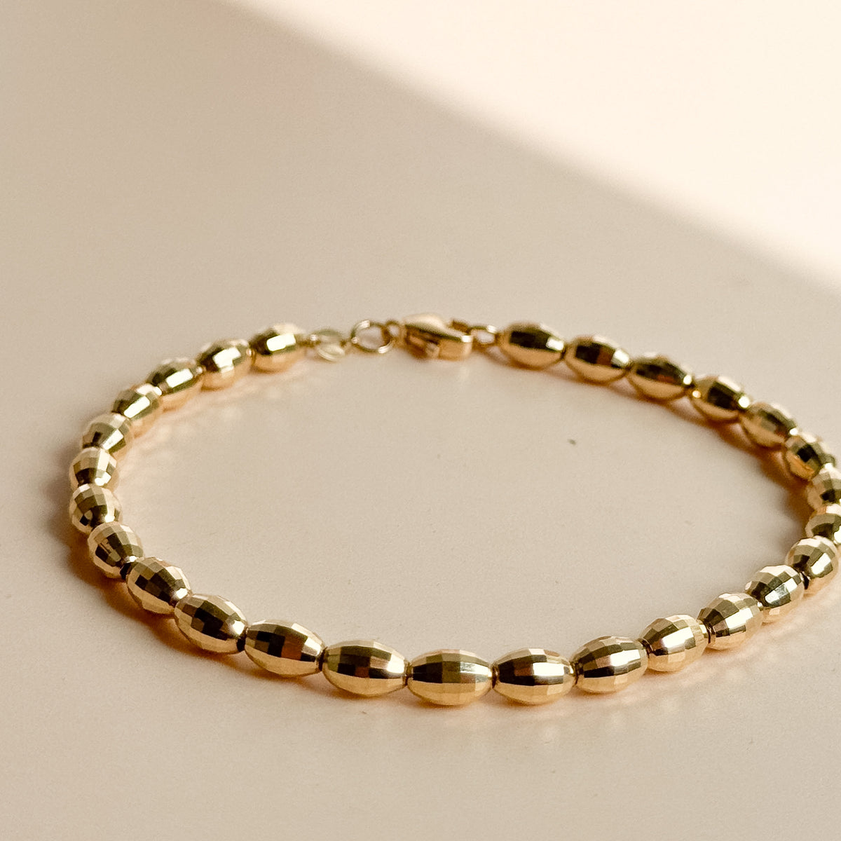 Pulsera de Esferas Facetadas de Oro 18K