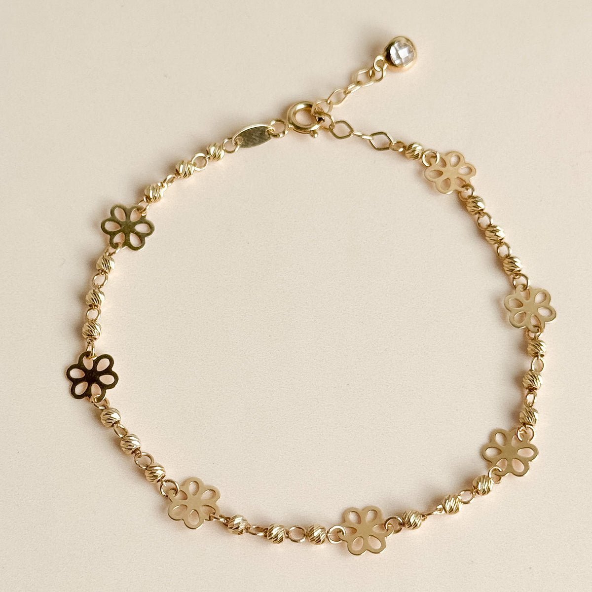 Pulsera Flores Caladas de Oro 18K