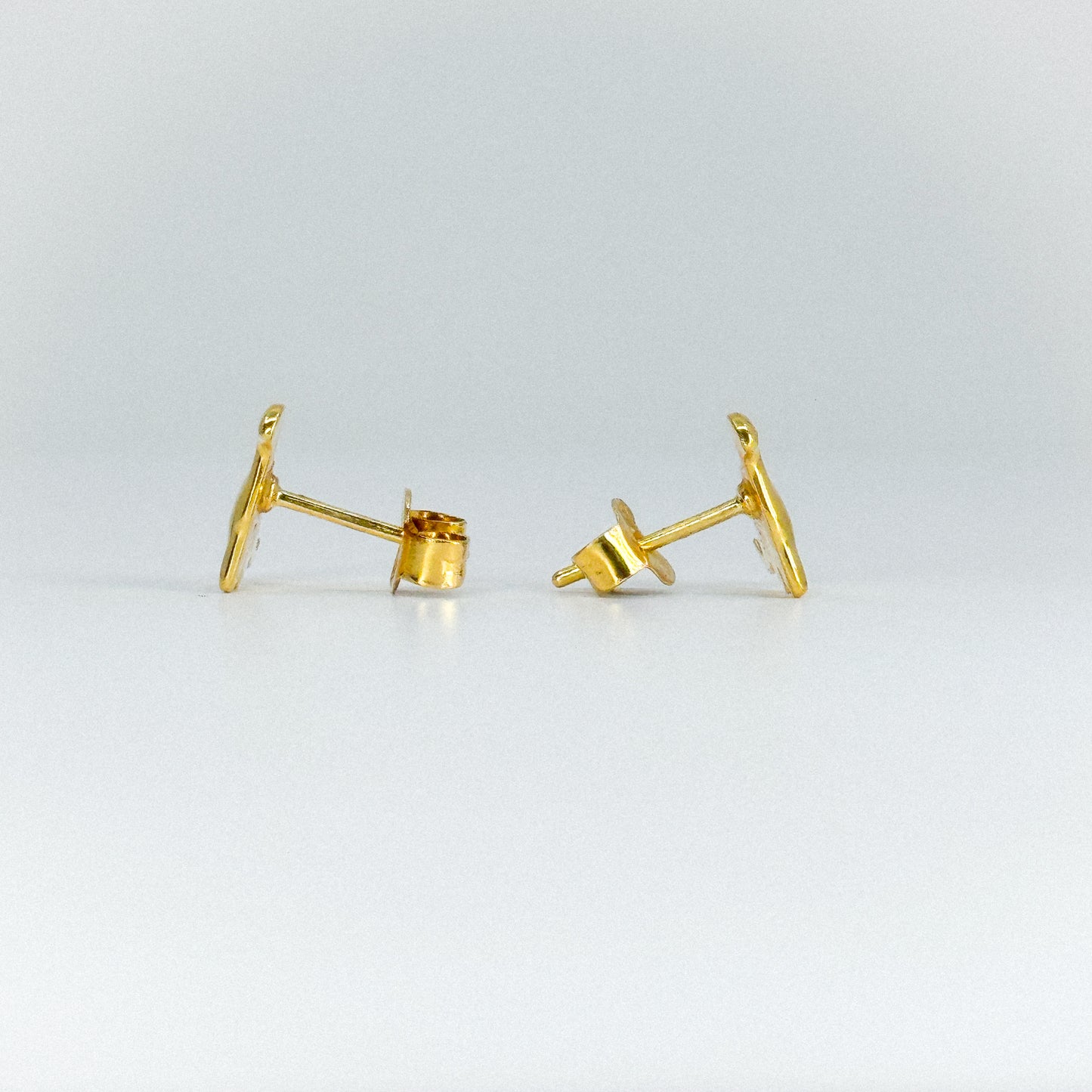 Aretes dinosaurio en oro 18k