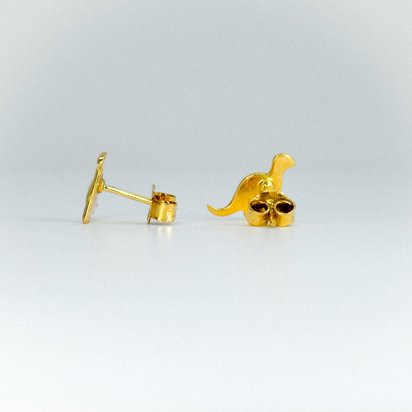Aretes dinosaurio en oro 18k