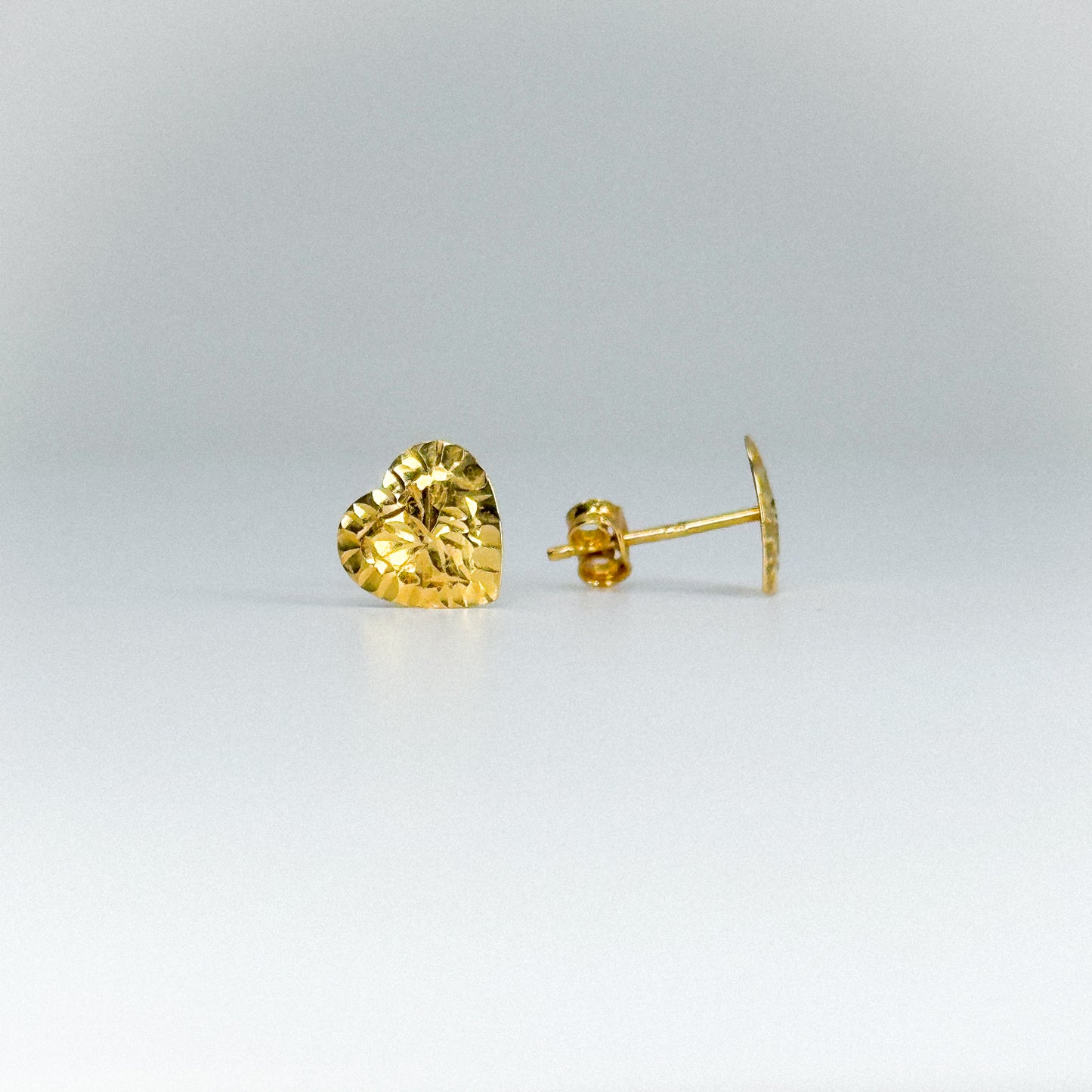 Aretes corazón facetado