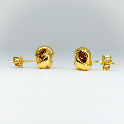 Aretes Triniti en oro 18k