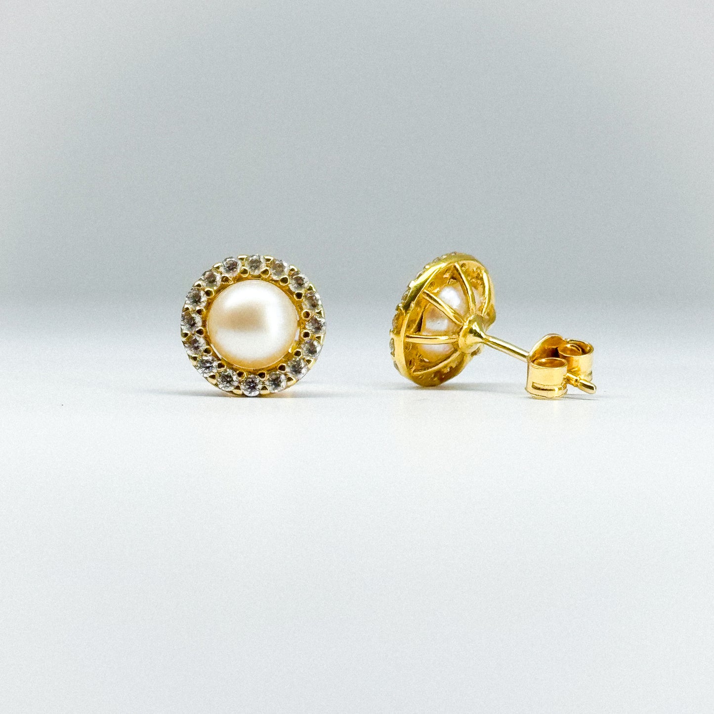 Aretes perla circular con cristales