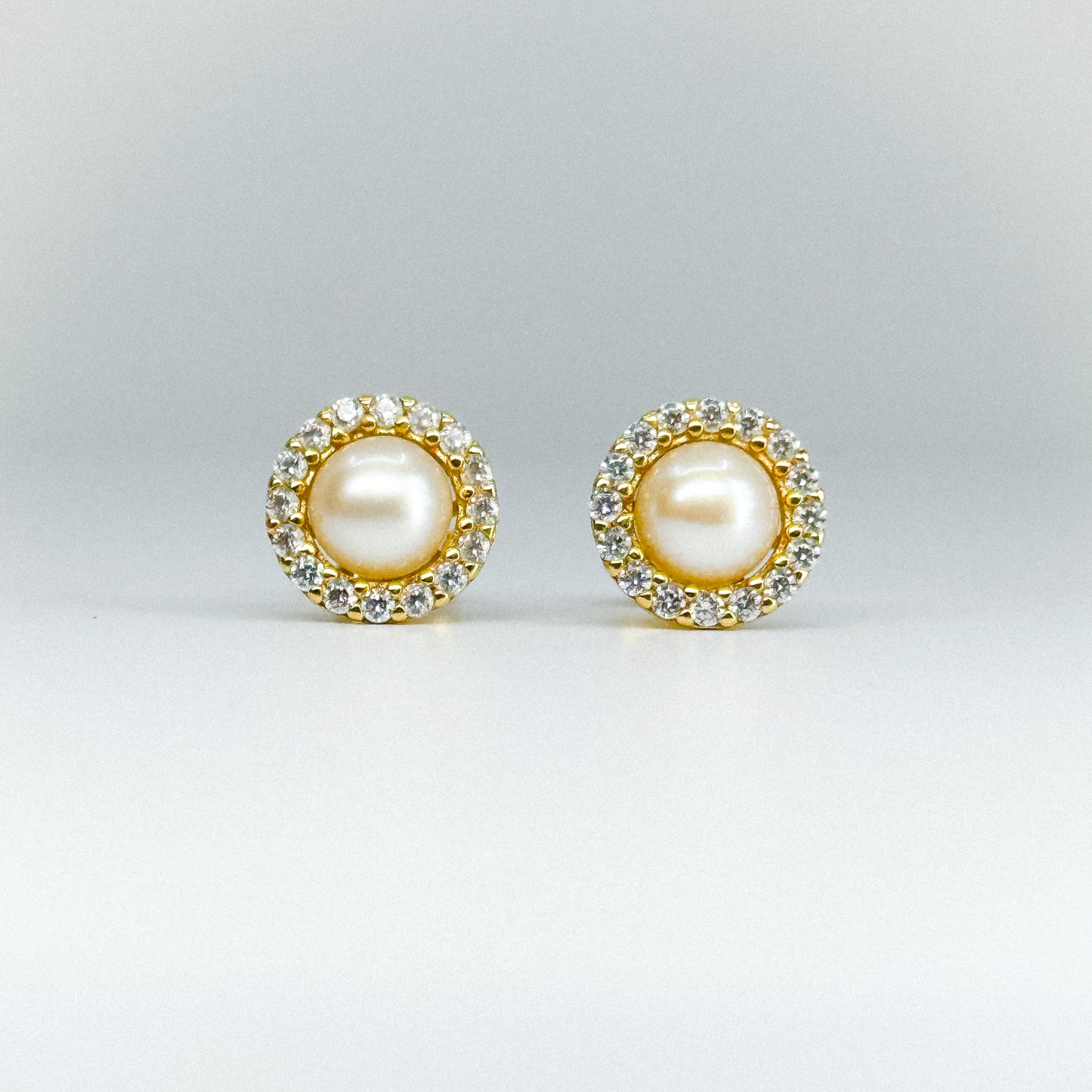 Aretes perla circular con cristales