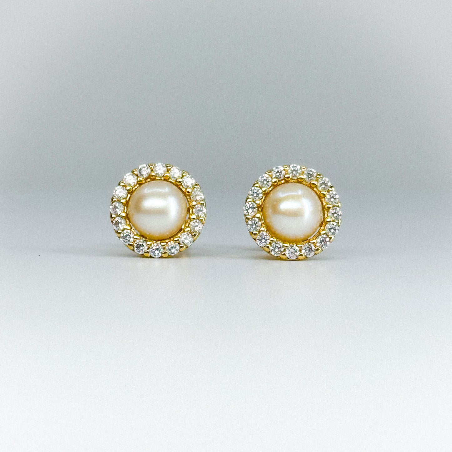 Aretes perla circular con cristales