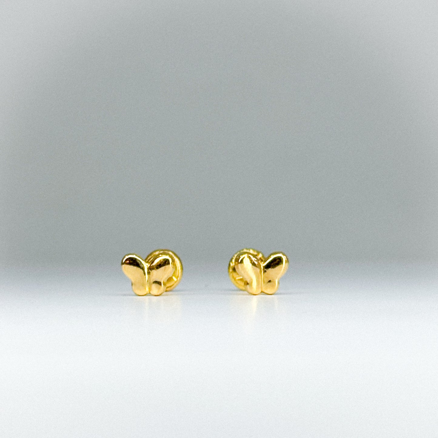 Aretes Topito Mariposa en oro 18k