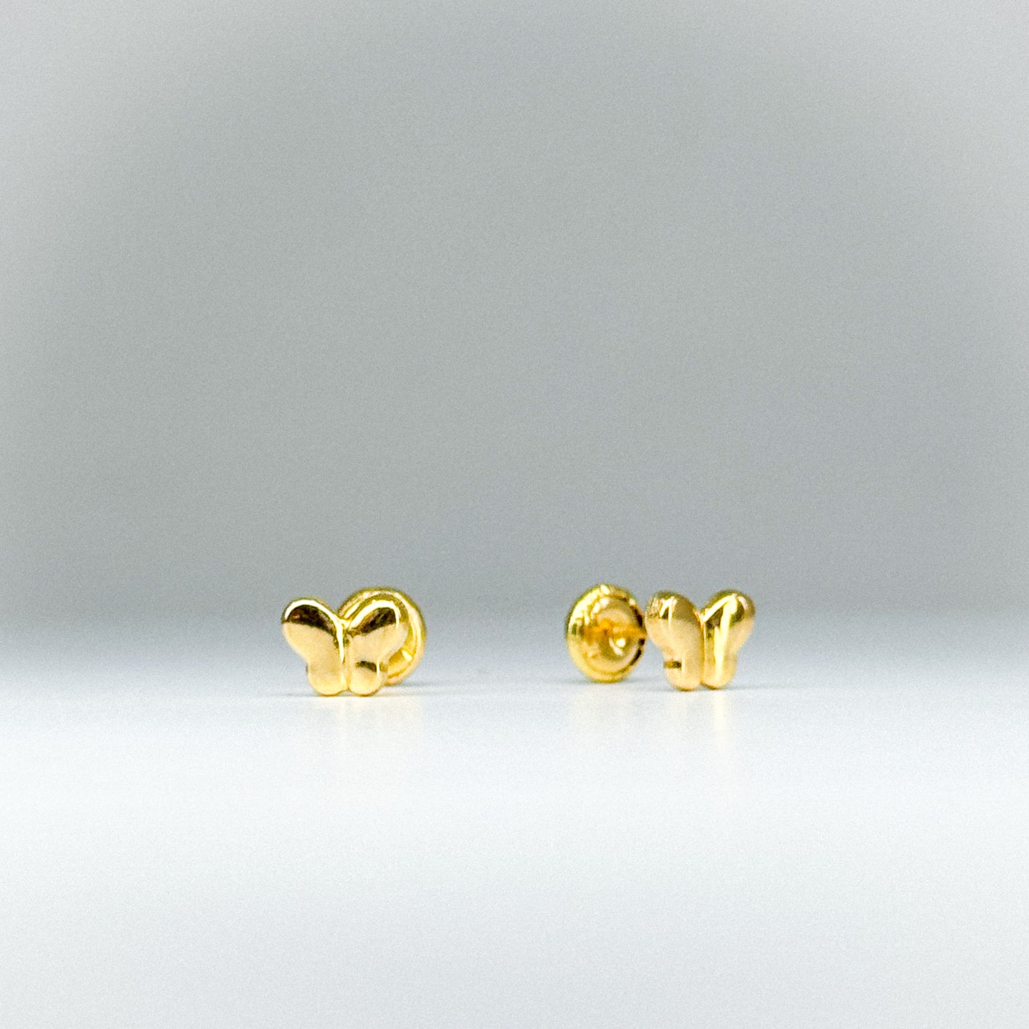 Aretes Topito Mariposa en oro 18k