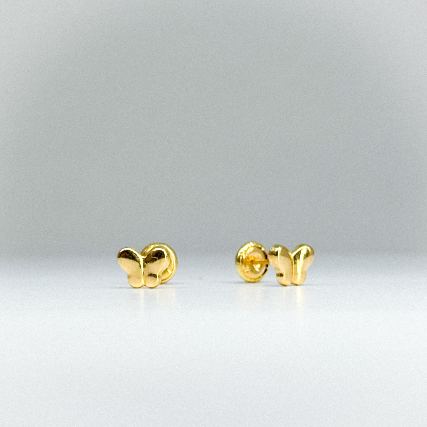 Aretes Topito Mariposa en oro 18k