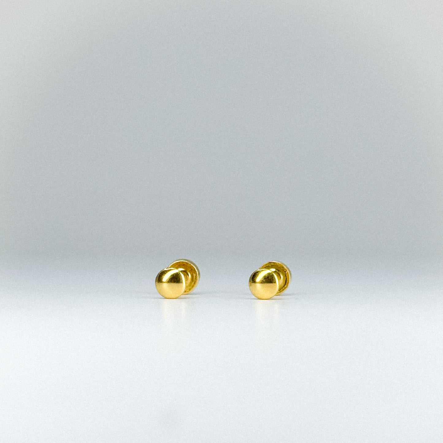 Aretes Topito Lenteja en oro 18k