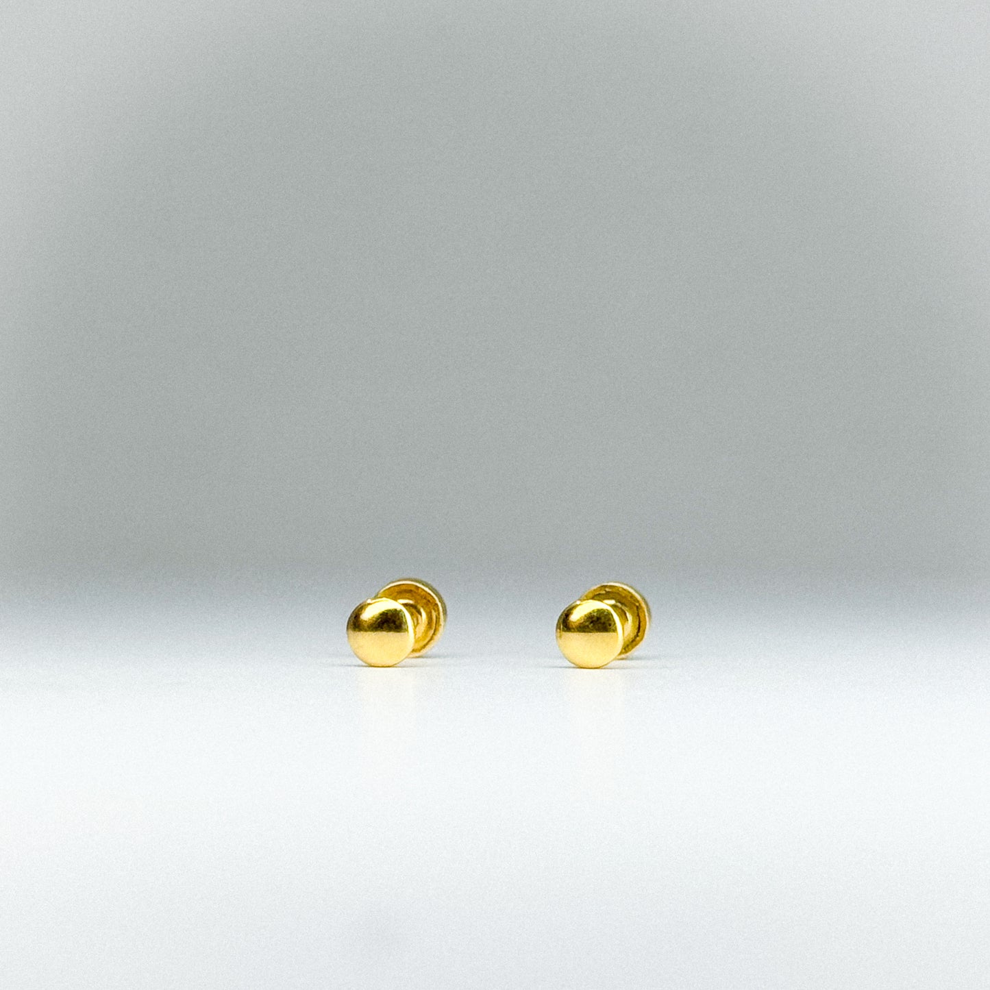 Aretes Topito Lenteja en oro 18k