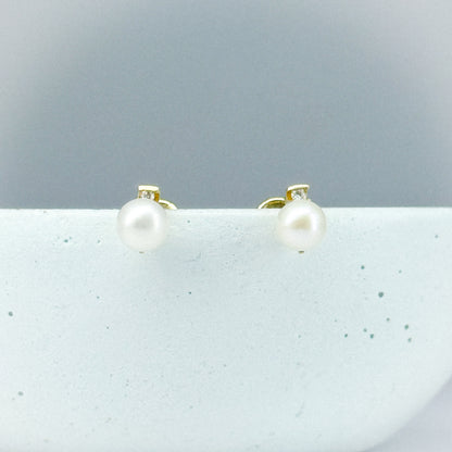 Aretes Topito Perla y Diamante en oro 18k