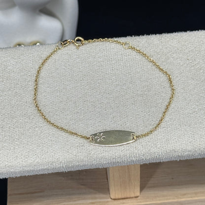 Pulsera Óvalo Flor Calada 2 cm – Oro 18K