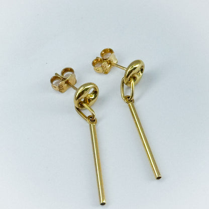 Aretes Línea Dorada