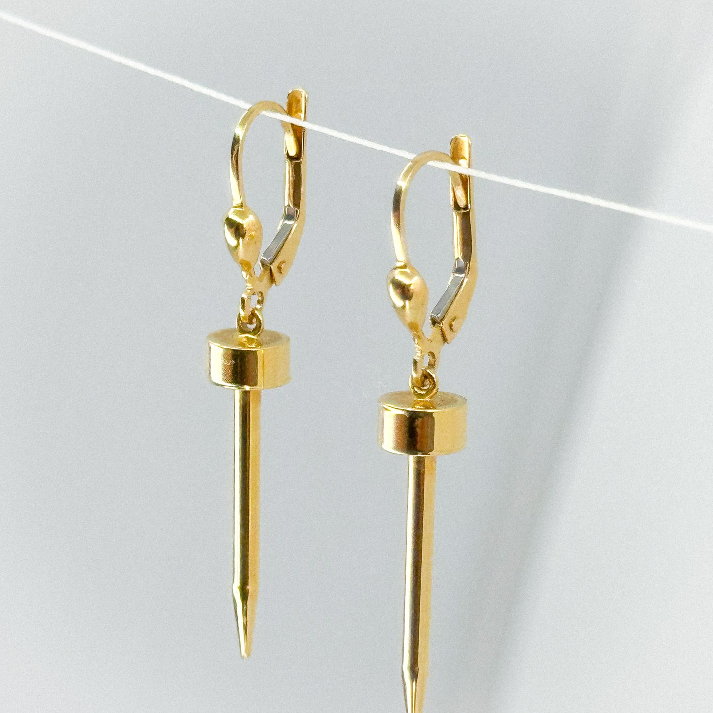 Aretes Dardo de Luz en Oro 18k