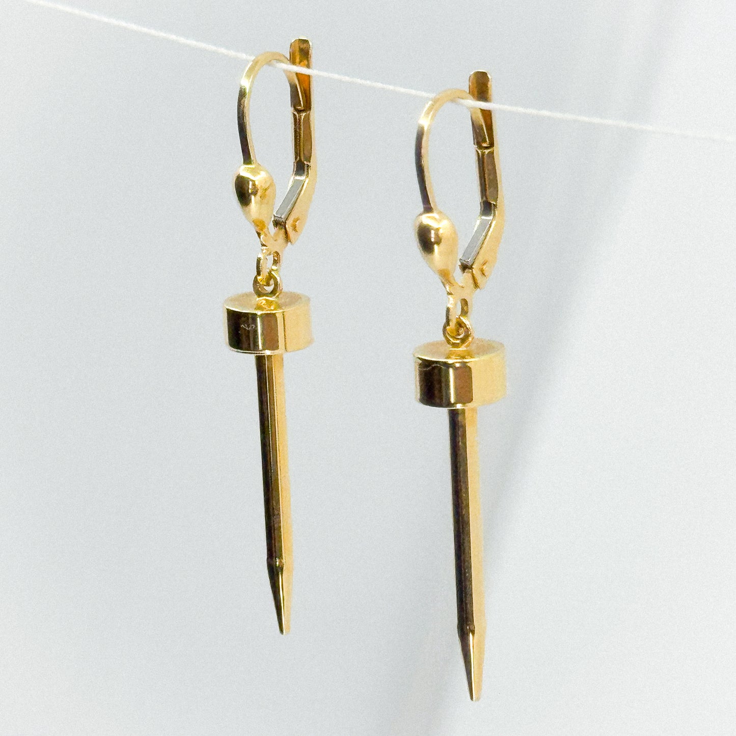 Aretes Dardo de Luz en Oro 18k