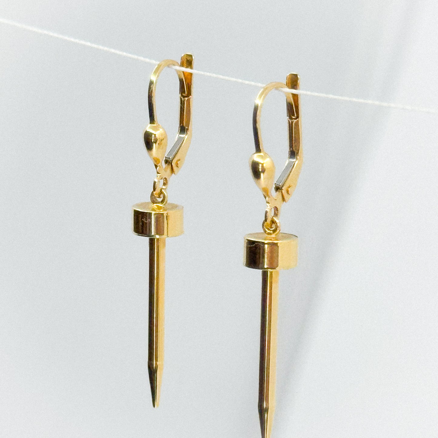 Aretes Dardo de Luz en Oro 18k