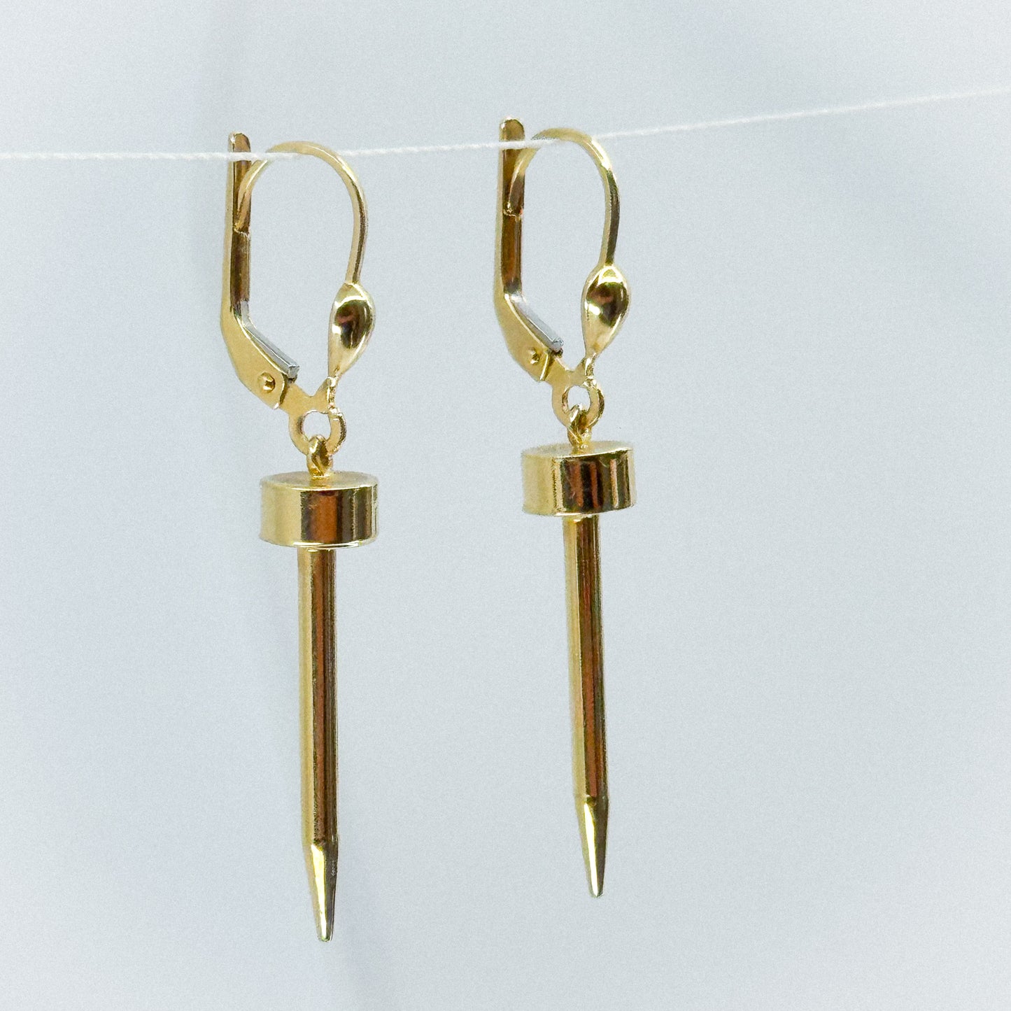 Aretes Dardo de Luz en Oro 18k