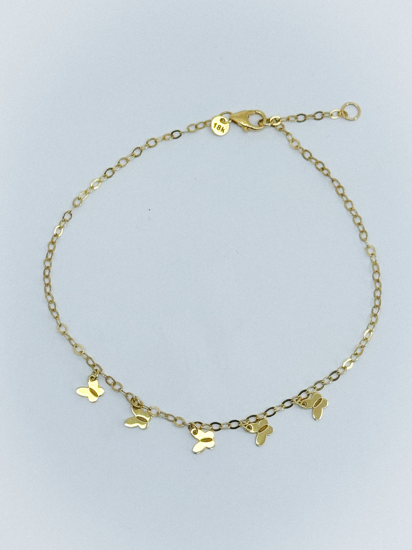 ✨ Tobillera “Vuelo Dorado”