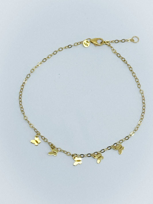 ✨ Tobillera “Vuelo Dorado”